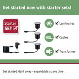 Starter set with black LED ground lights, cables, and transformer for garden lighting setup