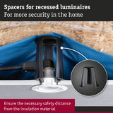 Black plastic spacer for recessed luminaires ensures safety distance from insulation material at home