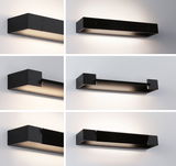 Black metal LED wall light with modern design and indirect lighting for living spaces.