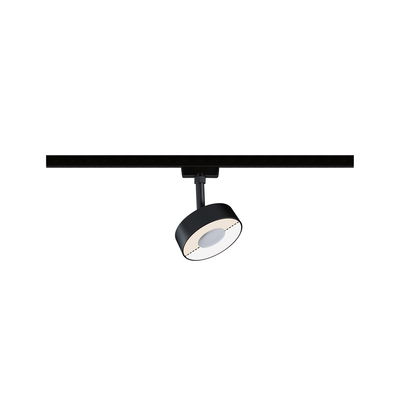 Schwarzer LED-Spot aus Metall an Schienensystem für flexible Beleuchtung im Wohnraum