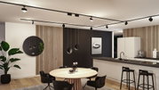 Moderne Küche mit runder Holz-Tischplatte, schwarzen Stühlen und minimalistischer LED-Deckenbeleuchtung