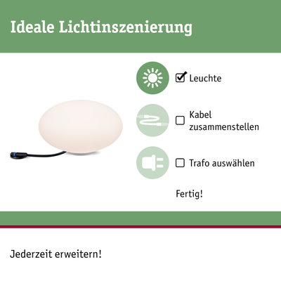 Weiße runde Leuchte mit schwarzem Kabel für flexible Lichtinszenierung und einfache Erweiterung