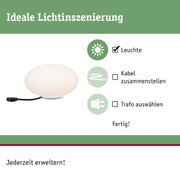 Weiße runde Leuchte mit schwarzem Kabel für flexible Lichtinszenierung und einfache Erweiterung