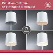 Lampadaire blanc dimmable avec abat-jour cylindrique montrant différents niveaux de luminosité