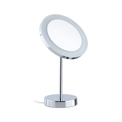 Round LED makeup mirror with chrome stand, illuminated cosmetic mirror for detailed beauty routines.