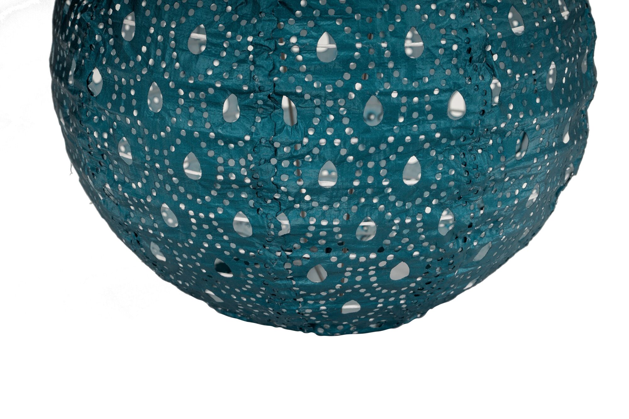 Round blue paper lampshade with perforated pattern for decorative lighting in living spaces