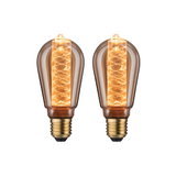 Zwei vintage LED-Glühbirnen mit Spiralfaden in bernsteinfarbenem Glas und E27 Sockel für dekorative Beleuchtung