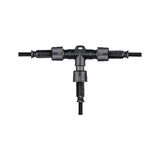 Black plastic T-connector with cable connections for outdoor electrical wiring and lighting setups