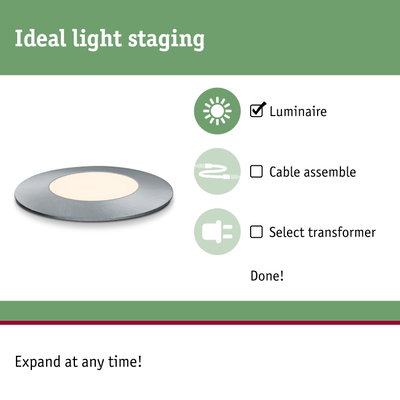 Round LED recessed light with silver metal frame and warm white light for modern room lighting