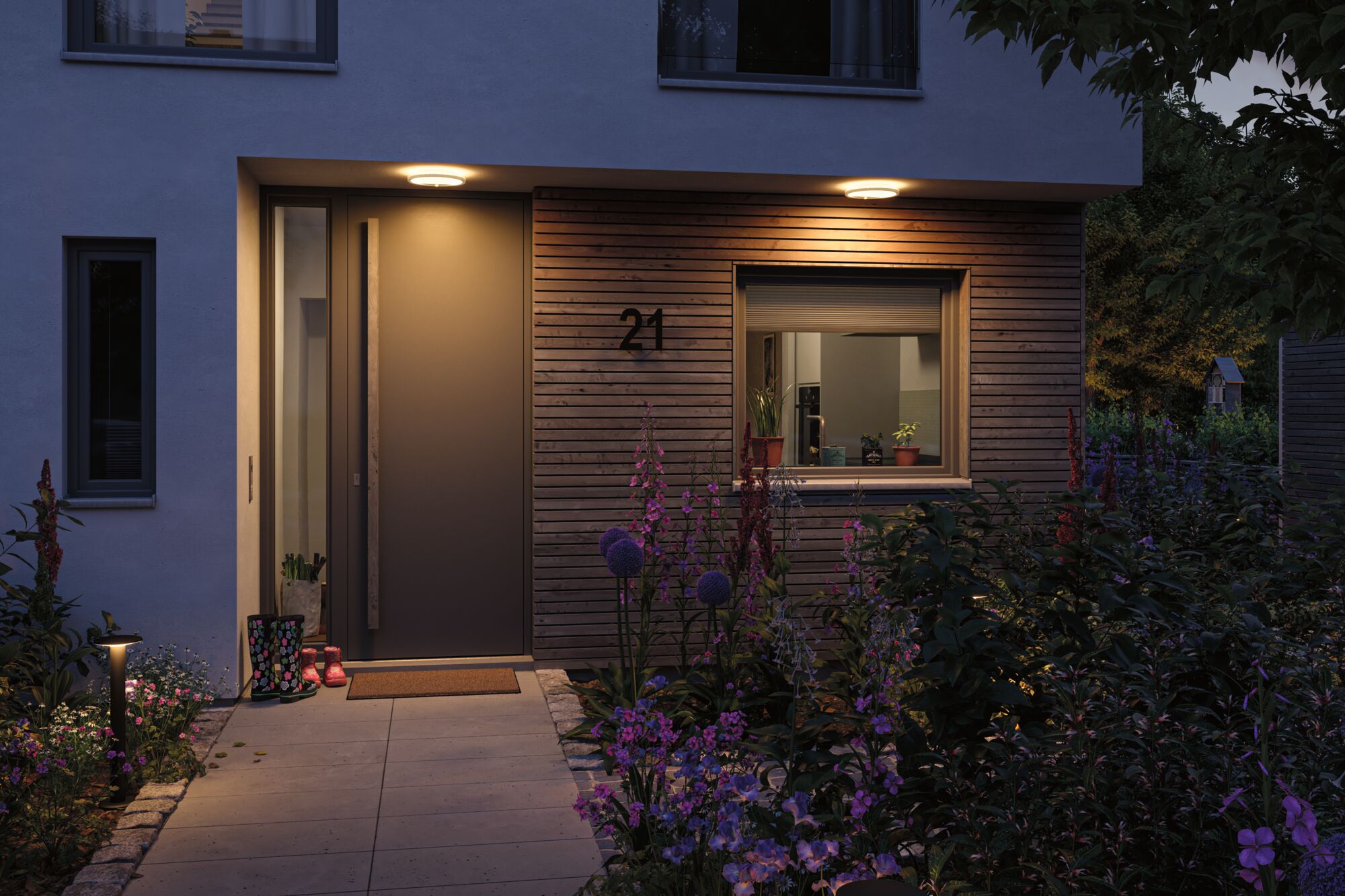 Modern house entrance with wooden cladding and warm white LED ceiling lights for outdoor lighting.