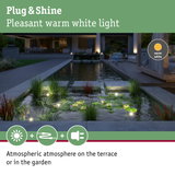 Outdoor lighting with warm white light creates a cozy atmosphere on terrace and garden