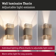 Tharin wall luminaire in beige metal with adjustable light cones and warm white light for cozy accents