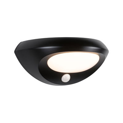 Black LED wall light with motion sensor and white diffuser for energy-efficient outdoor lighting
