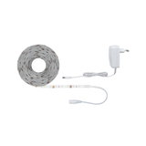 Bande LED blanche avec adaptateur secteur et câble de connexion pour éclairage flexible.