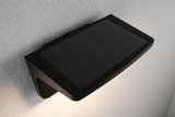 Black metal solar wall light with integrated solar panel and warm white LED for outdoor lighting