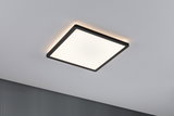 Quadratische Deckenleuchte mit schwarzem Rahmen und warmweißem LED-Licht für moderne Innenräume.