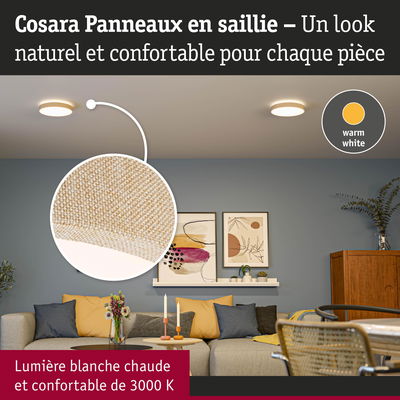 Salon avec canapé beige et éclairage plafond blanc chaud pour une ambiance confortable et moderne