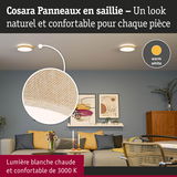 Salon avec canapé beige et éclairage plafond blanc chaud pour une ambiance confortable et moderne