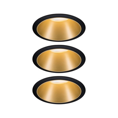 Three round recessed lights with black trim and gold reflector for modern LED lighting solutions.