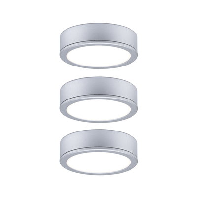 Three round silver aluminum LED ceiling lights with warm white light for modern interior lighting