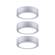 Three round silver aluminum LED ceiling lights with warm white light for modern interior lighting
