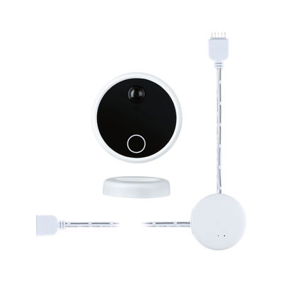 Round white LED motion sensor set with black sensor unit and connection cable for light control