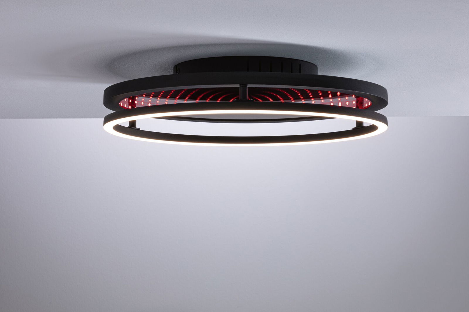 Plafonnier noir moderne avec anneau LED et effet miroir infini rouge pour un éclairage élégant
