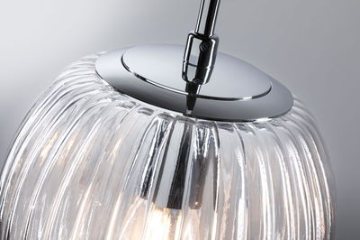Modern pendant light with ribbed glass and chrome metal, clear design ideal for living spaces lighting.