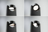 Four views of a black aluminum outdoor spotlight with adjustable LED head and warm white light.
