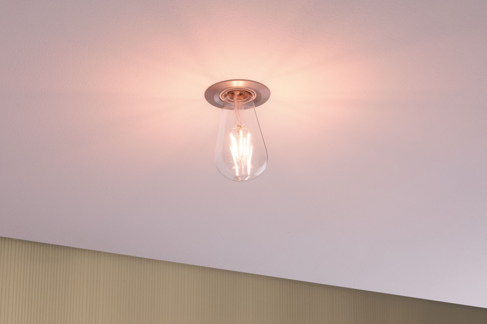 Ceiling light with clear glass and warm white LED bulb for cozy ambient lighting in rooms
