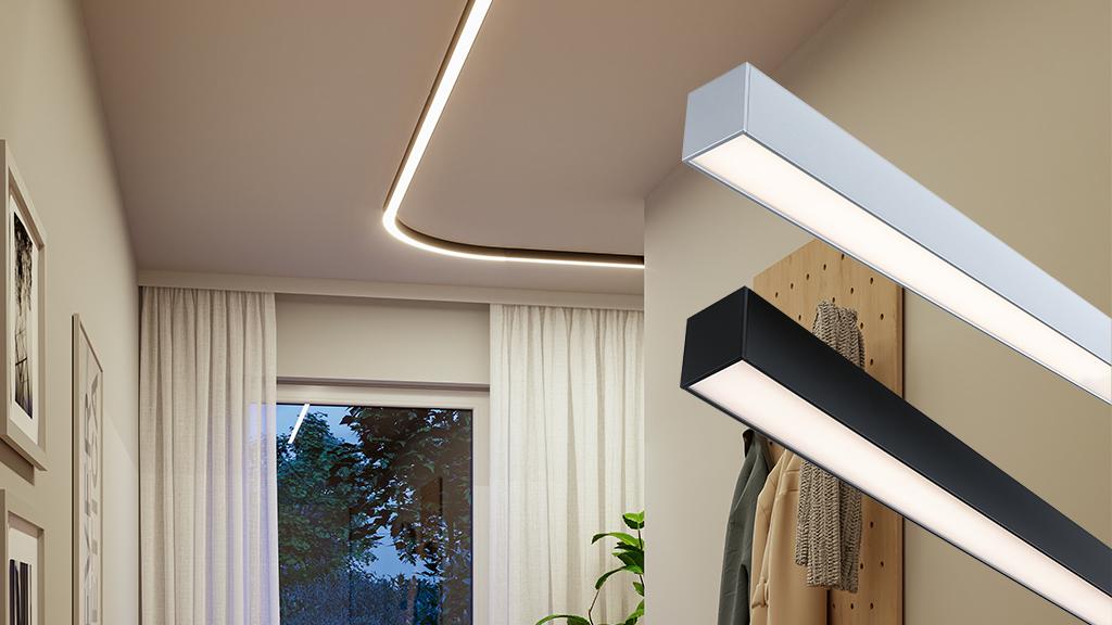 Moderne woonkamer met witte en zwarte aluminium LED-plafondlampen, warm wit licht.