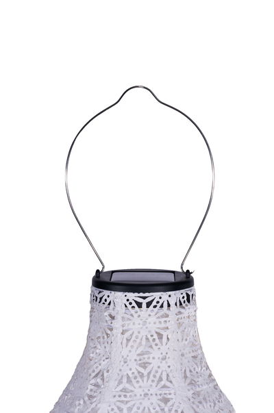 White solar lantern with delicate pattern and metal handle for garden and outdoor lighting