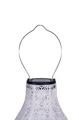 White solar lantern with delicate pattern and metal handle for garden and outdoor lighting