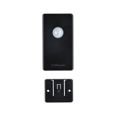 Black plastic motion sensor with mounting bracket for smart lighting control