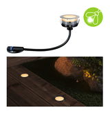 Round LED recessed light with black cable and warm white glow for garden and terrace lighting