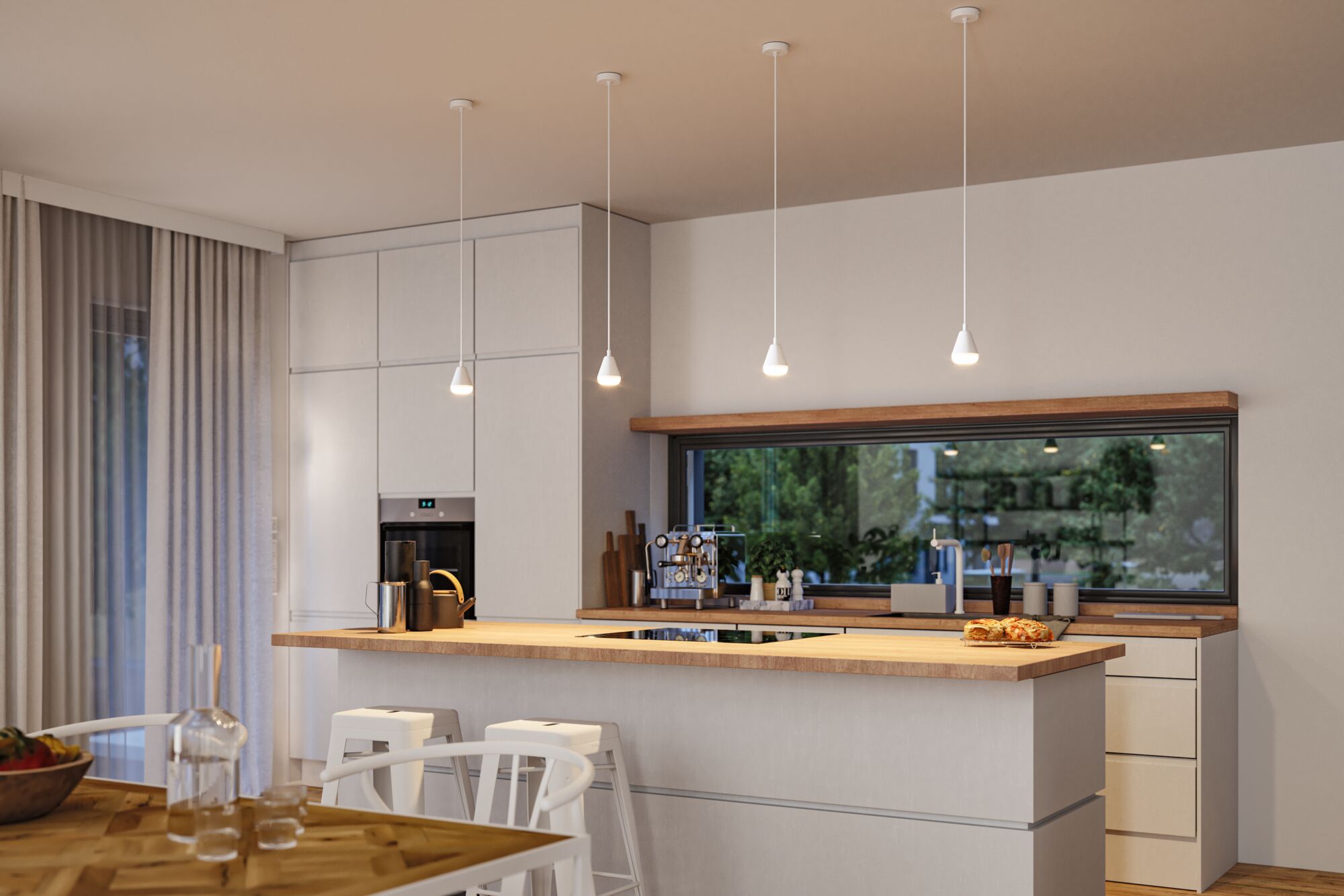 Moderne weiße Kücheninsel mit Holzarbeitsplatte und vier minimalistischen Pendelleuchten aus Metall.