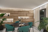 Modernes Esszimmer mit schwarzem Tisch, türkisfarbenen Stühlen und Holzpaneelwand mit LED-Beleuchtung