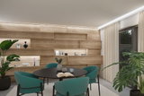 Modern dining room with black table, teal chairs and wooden panel wall with LED lighting