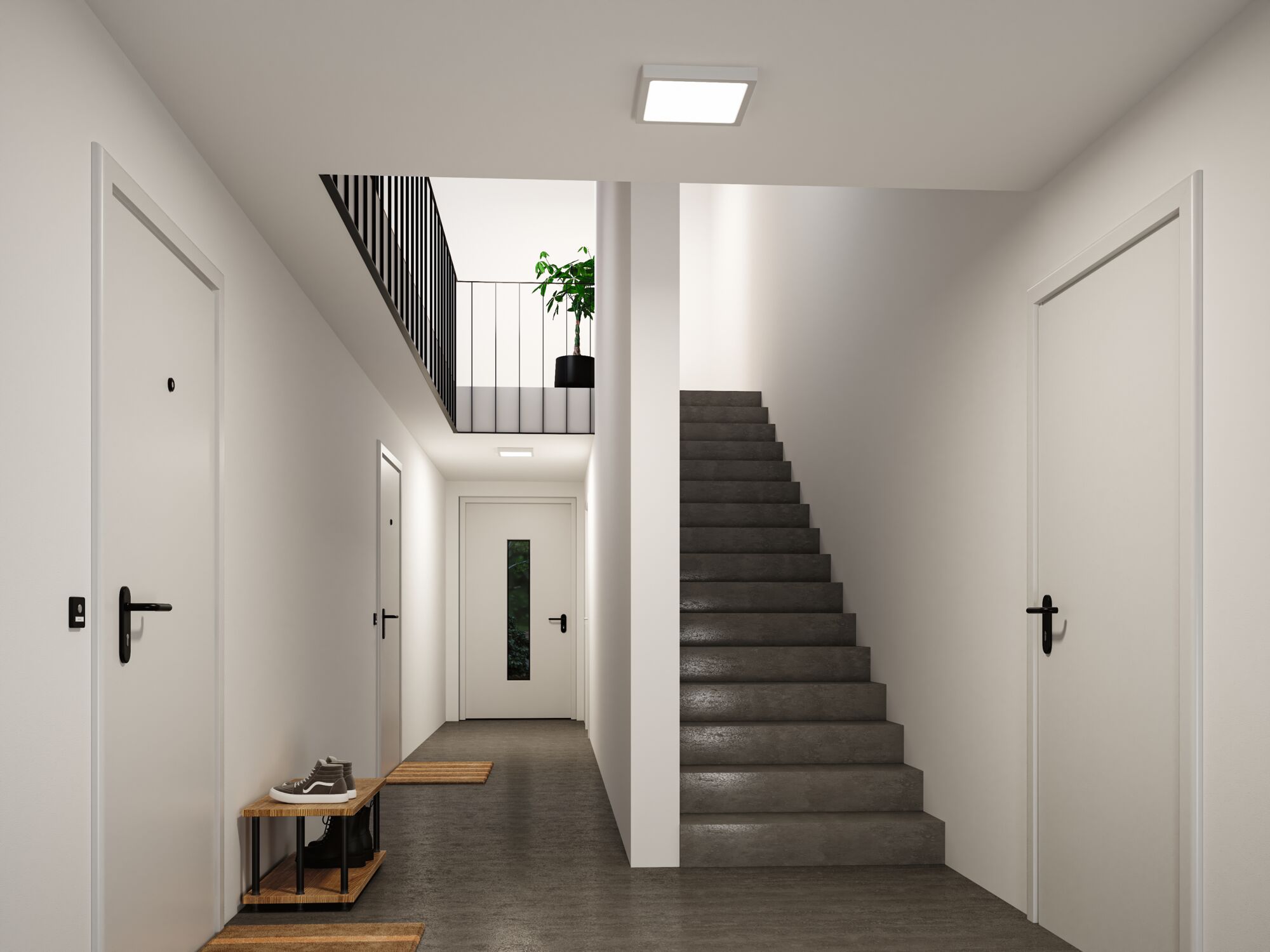 Modernes Treppenhaus mit grauem Boden, weißen Türen und quadratischer Deckenleuchte aus Kunststoff
