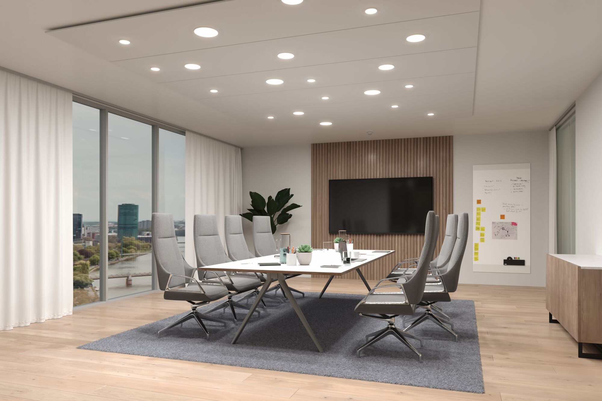 Modernes Konferenzzimmer mit grauen Bürostühlen und weißem Tisch auf grauem Teppich, LED-Deckenbeleuchtung