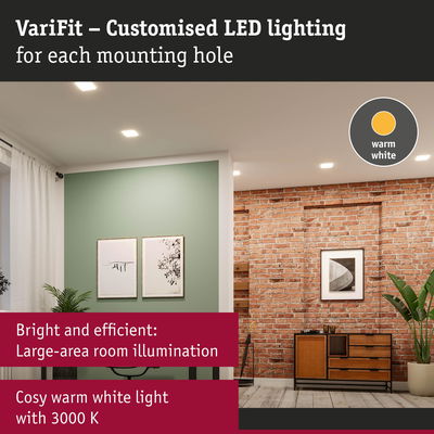 Living room with warm white LED ceiling lights providing bright, efficient large-area illumination