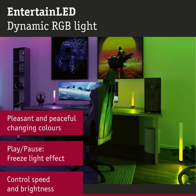 Dynamic RGB LED light sticks in green and purple for gaming setup with adjustable brightness and speed control
