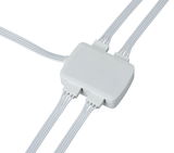 White plastic connector box with multiple cable ports for LED lighting systems