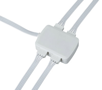 White plastic connector box with multiple cable ports for LED lighting systems