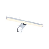 Modern chrome LED mirror light with warm white glow and touch switch for bathroom lighting