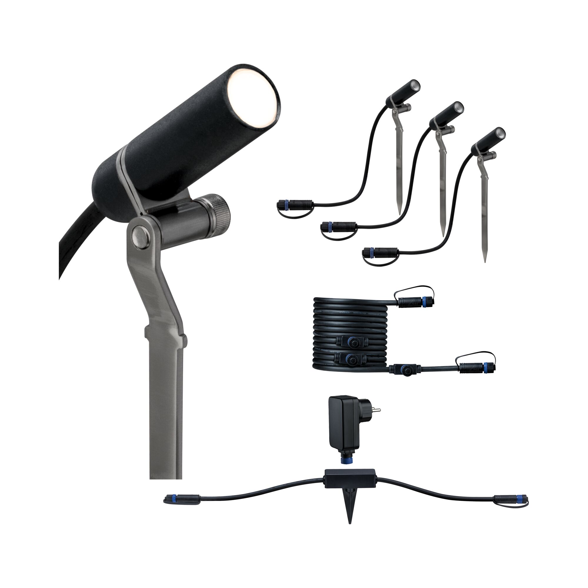 Ensemble de projecteurs LED noirs avec piquets, câble et adaptateur pour éclairage extérieur.
