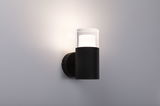 Modern black outdoor wall light with clear glass and warm white illumination for exterior use