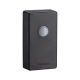 Black plastic housing with round sensor lens, Paulmann motion detector for light control