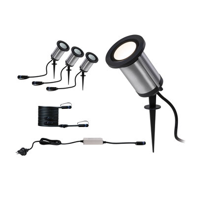 Set of four stainless steel garden spotlights with black ground spikes and cables for outdoor lighting