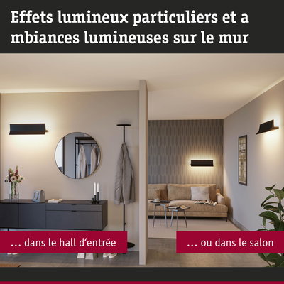 Appliques murales noires avec lumière chaude dans hall d'entrée et salon moderne avec canapé